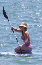 HILARY DUFF in Bikini Paddleboarding in Malibu 07/04/2022