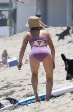 HILARY DUFF in Bikini Paddleboarding in Malibu 07/04/2022