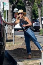 JENNIFER ANISTON Leaves a Hair Salon in Beverly Hills 07/13/2022