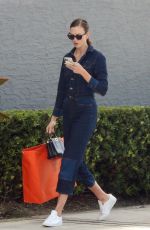 KARLIE KLOSS in Denim Jumpsuit Out in Miami 07/08/2022