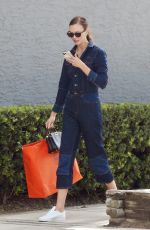 KARLIE KLOSS in Denim Jumpsuit Out in Miami 07/08/2022