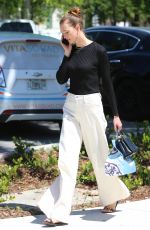 KARLIE KLOSS Out Shopping in Miami 07/13/2022