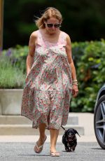 KATIE COURIC Out with a New Puppy in The Hamptons 07/08/2022