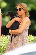 KATIE COURIC Out with a New Puppy in The Hamptons 07/08/2022