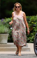 KATIE COURIC Out with a New Puppy in The Hamptons 07/08/2022