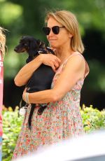 KATIE COURIC Out with a New Puppy in The Hamptons 07/08/2022