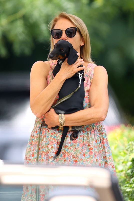 KATIE COURIC Out with a New Puppy in The Hamptons 07/08/2022