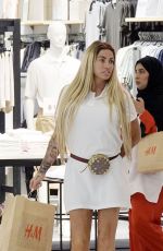 KATIE PRICE and Carl Woods Out Shopping in Phuket 06/29/2022