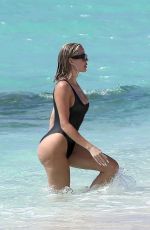 KHLOE KARDASHIAN in Swimsuit at a Beach in Turks and Caicos 07/13/2022
