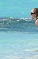 KHLOE KARDASHIAN in Swimsuit at a Beach in Turks and Caicos 07/13/2022