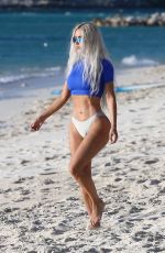 KIM KARDASHIAN in Bikini Bottom at a Beach in Turks and Caicos 07/12/2022