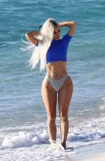 KIM KARDASHIAN in Bikini Bottom at a Beach in Turks and Caicos 07/12/2022