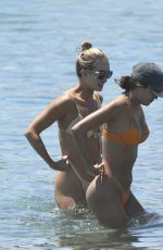 KYRA TRANSTRUM and MADDIE YOUNG in Bikinis at a Beach in Mykonos 07/13/2022