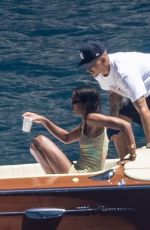 LAURA HARRIER in Bikini and Sam Jarou at a Boat in Positano 07/13/2022