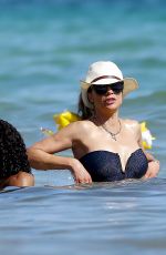 LILLY BECKER in Swimsuit takes on the Beach in Ibiza 07/22/2022