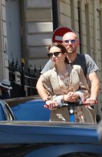 LILY COLLINS and Charlie McDowell at an Electric Scooter Out in Paris 07/02/2022