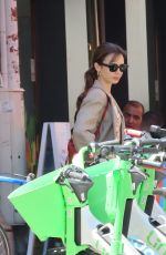 LILY COLLINS and Charlie McDowell at an Electric Scooter Out in Paris 07/02/2022
