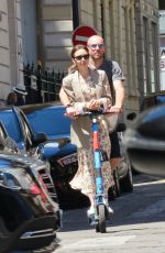 LILY COLLINS and Charlie McDowell at an Electric Scooter Out in Paris 07/02/2022