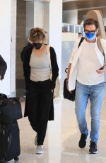 LISA RINNA at LAX Airport in Los Angeles 07/07/2022