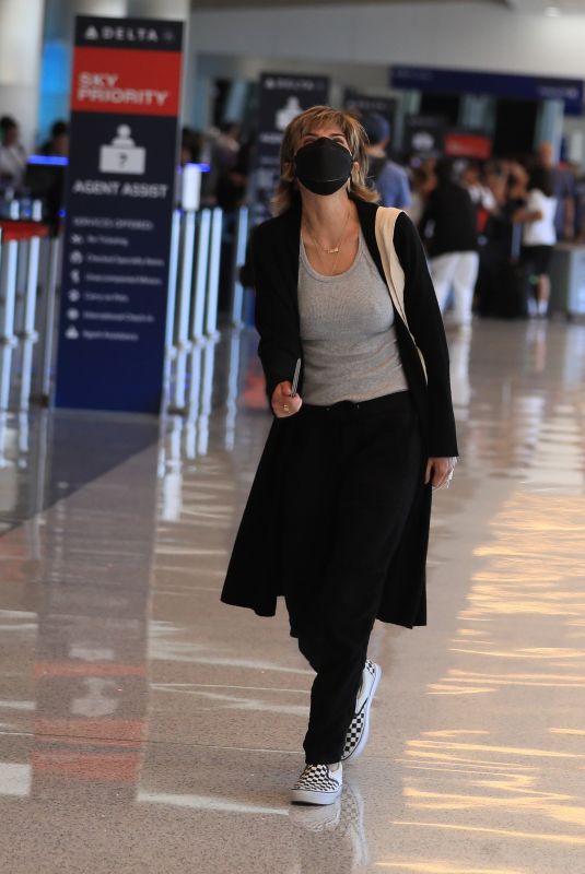 LISA RINNA at LAX Airport in Los Angeles 07/07/2022