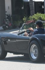 MILA KUNIS and Ashton Kutcher Riding His Classic Ford Convertible Out in Los Angeles 07/29/2022