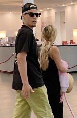 MILLIE BOBBY BROWN and Jake Bongiovi Arriving at Olbia Costa Smeralda Airport 07/13/2022