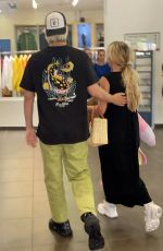 MILLIE BOBBY BROWN and Jake Bongiovi Arriving at Olbia Costa Smeralda Airport 07/13/2022