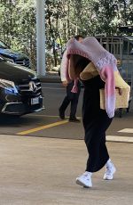 MILLIE BOBBY BROWN and Jake Bongiovi Arriving at Olbia Costa Smeralda Airport 07/13/2022