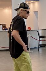 MILLIE BOBBY BROWN and Jake Bongiovi Arriving at Olbia Costa Smeralda Airport 07/13/2022