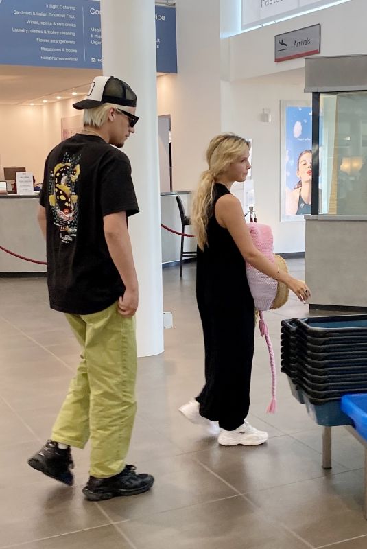 MILLIE BOBBY BROWN and Jake Bongiovi Arriving at Olbia Costa Smeralda Airport 07/13/2022