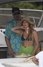 MILLIE BOBBY BROWN in Bikini Top at a Boat in Sardinia 07/07/2022 