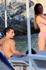 MILLIE MACKINTOSH in Bikini and Hugo Taylor at a Beach on Corfu Island 07/23/2022
