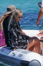 NATASHA POLY Arrives at Club 55 Beach in Saint-Tropez 07/01/2022