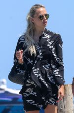 NATASHA POLY Arrives at Club 55 Beach in Saint-Tropez 07/01/2022