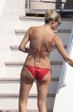 NATASHA POLY in Bikini at a Yacht in St Tropez 07/19/2022