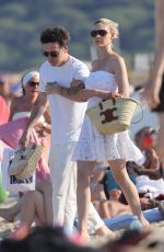 NICOLA PELTZ and Brooklyn Beckham Leaves Club 55 in Saint-Tropez 07/13/2022