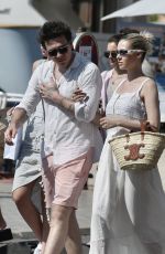 NICOLA PELTZ and Brooklyn Beckham Out in St Tropez 07/14/2022