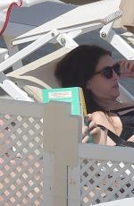 RAINEY QUALLEY in Bikini and Lewis Pullman at a Beach in Portofino 07/12/2022
