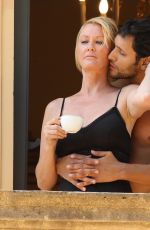 SANDRA LEE and Ben Youcef Relax on Their Balcony in Cernobbio 07/08/2022