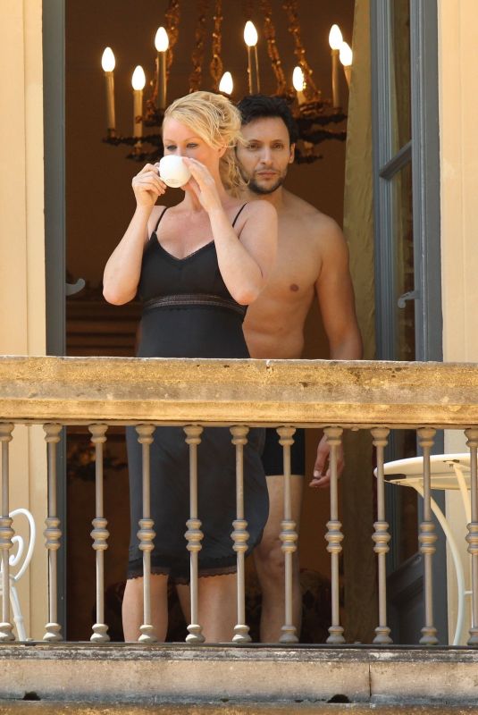 SANDRA LEE and Ben Youcef Relax on Their Balcony in Cernobbio 07/08/2022