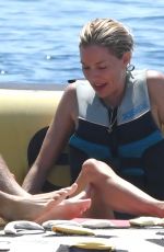 SIENNA MILLER and Oli on Vacation at Cap Antibes Eden Roc Hotel 07/21/2022