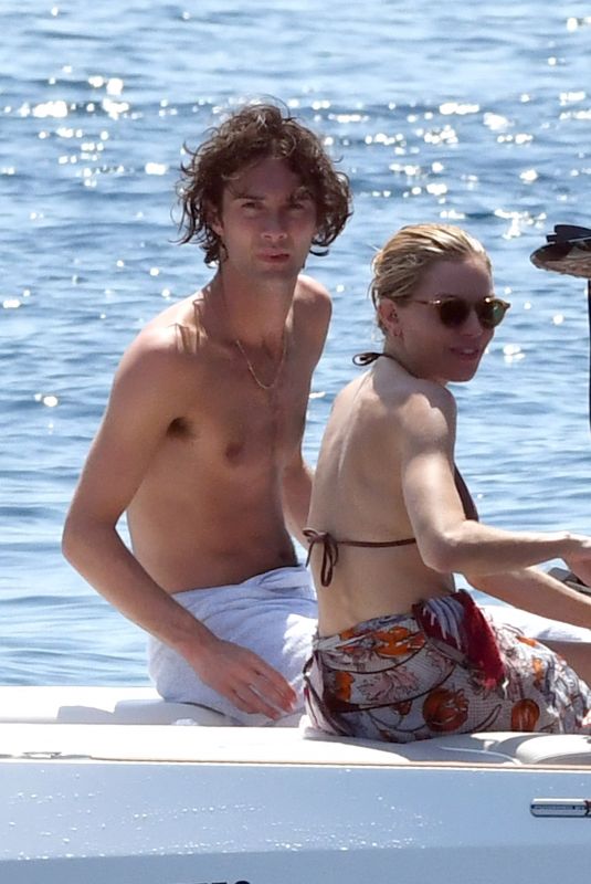 SIENNA MILLER and Oli on Vacation at Cap Antibes Eden Roc Hotel 07/21/2022