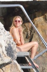 SIENNA MILLER in Bikini on Holiday at Cap Antibes Eden Roc Hotel 07/22/2022