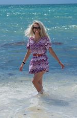 TANIA MARIE CARINGI at a Beach on South Beach 07/30/2022