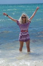 TANIA MARIE CARINGI at a Beach on South Beach 07/30/2022