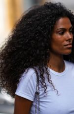 TINA KUNAKEY Arrives at Paco Rabanne Fashion Show in Paris 07/03/2022