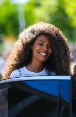 TINA KUNAKEY Arrives at Paco Rabanne Fashion Show in Paris 07/03/2022