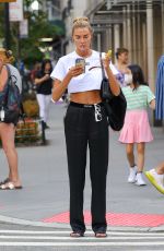 ALINA BAIKOVA Out Smoking Her Vape in New York 08/18/2022