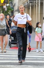 ALINA BAIKOVA Out Smoking Her Vape in New York 08/18/2022