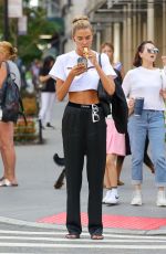 ALINA BAIKOVA Out Smoking Her Vape in New York 08/18/2022